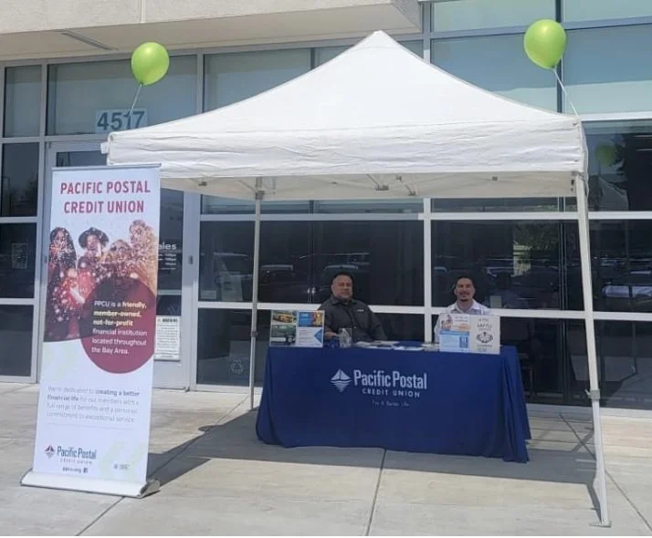 PPCU event booth before rebrand