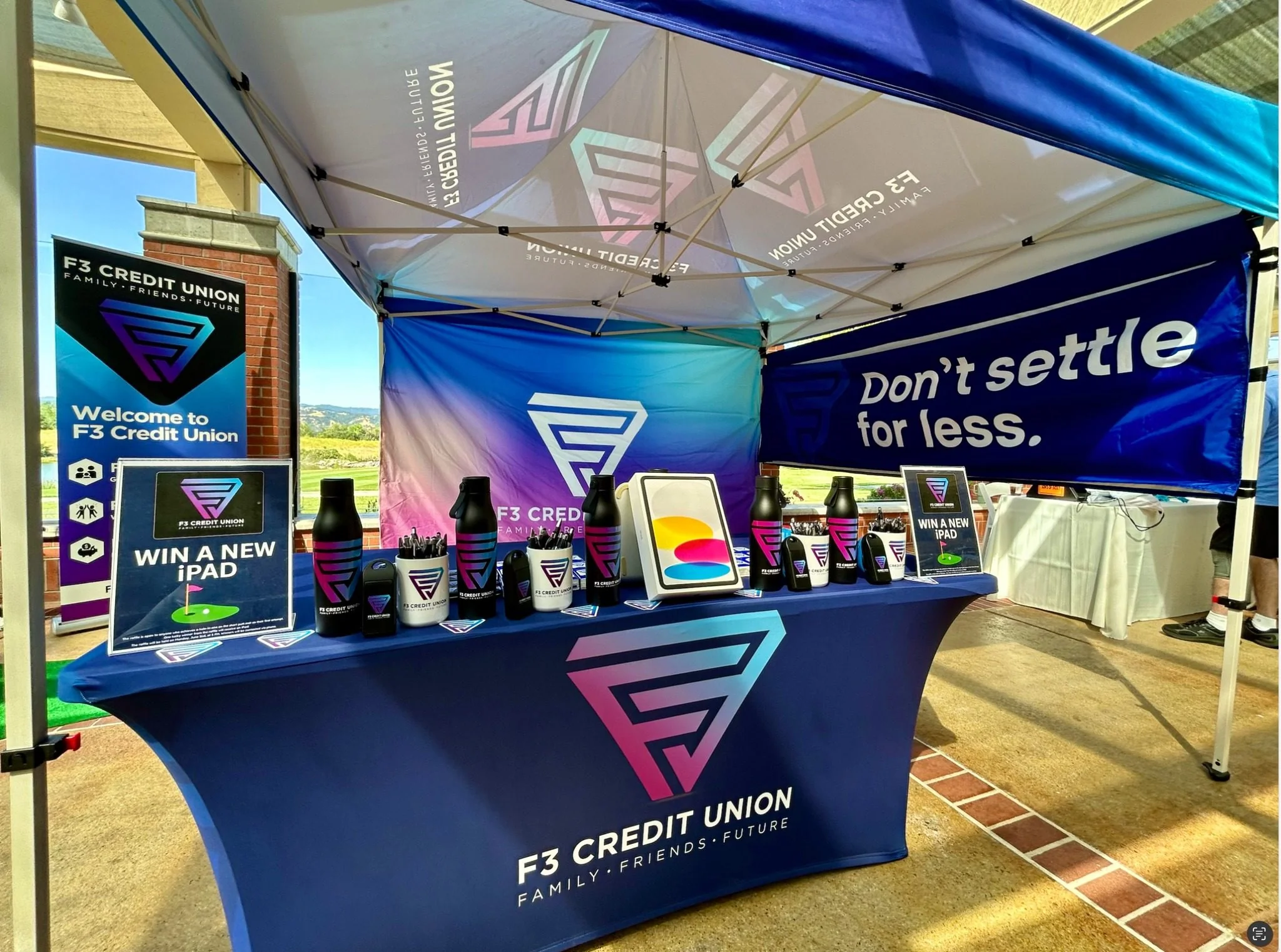 F3 Credit Union event booth — brand deployed in the field